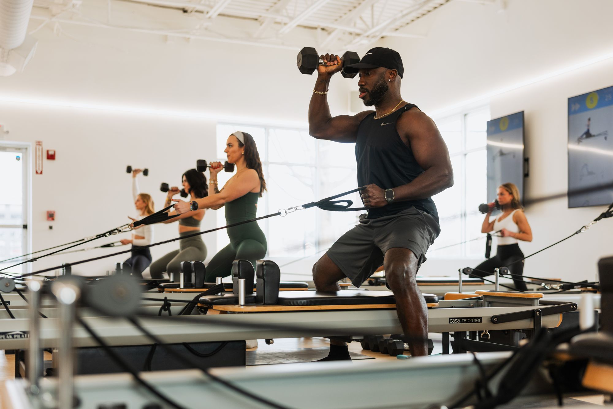 Members taking part in a full fitness class